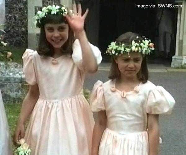 Kate và em gái Pippa khi còn nhỏ, đi nâng váy cưới cho cô dâu trong hôn lễ của chú mình (ông Gary). Ảnh: SWNS. Kate và em gái Pippa khi còn nhỏ, đi nâng váy cưới cho cô dâu trong hôn lễ của chú mình (ông Gary). Ảnh: SWNS.