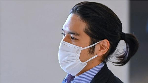 Anh Komuro với mái tóc khác biệt so với hồi anh ở Nhật. Ảnh: AFP. Anh Komuro với mái tóc khác biệt so với hồi anh ở Nhật. Ảnh: AFP.