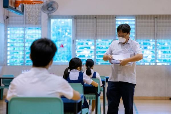 Học sinh ở Singapore đang thi tốt nghiệp tiểu học. Ảnh: Bộ Giáo dục Singapore. Học sinh ở Singapore đang thi tốt nghiệp tiểu học. Ảnh: Bộ Giáo dục Singapore.