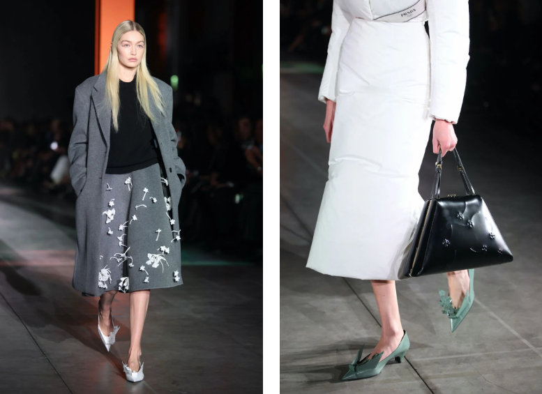 Và vì đi theo chủ nghĩa tối giản, trong bộ sưu tập của Prada không còn chỗ cho các phụ kiện - ngoại trừ những chiếc túi xách với hình tam giác, kiểu dáng đơn giản mà vô cùng cuốn hút.