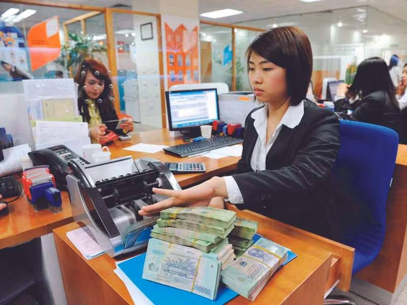 Sau Tết, các ngân hàng vẫn chưa hết căng thanh khoản. Ảnh: Hồng Vĩnh