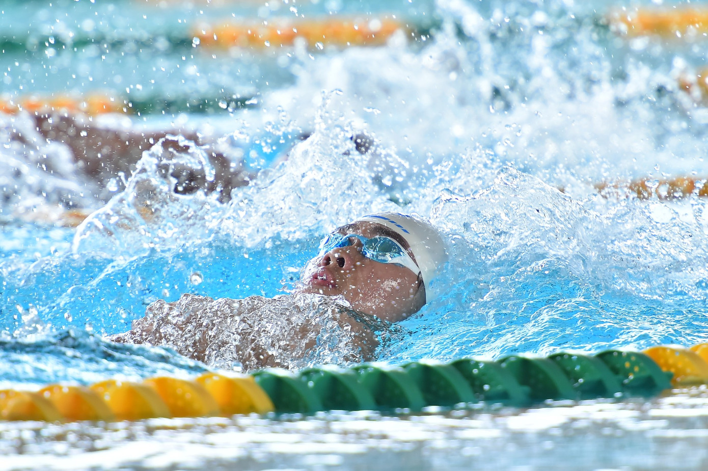 Các vận động viên thi đấu môn Bơi.