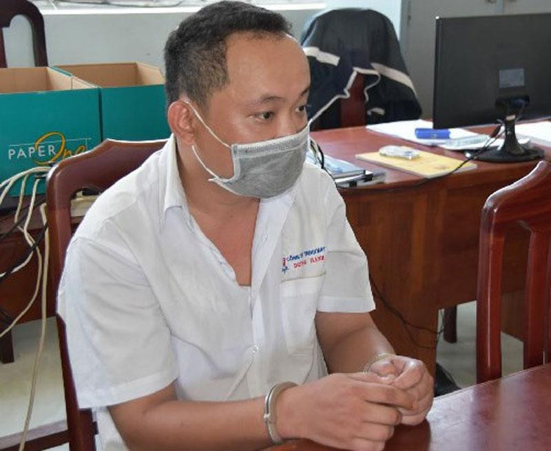 Huỳnh Nhật Tôn tại cơ quan công an. Ảnh: CA.