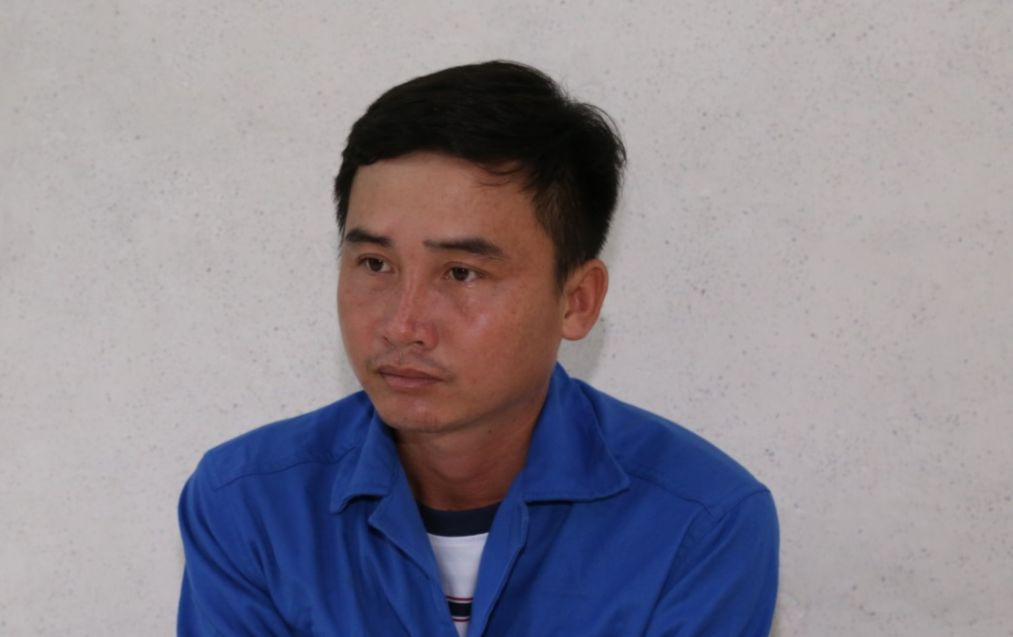 Trần Văn Toàn tại cơ quan công an.