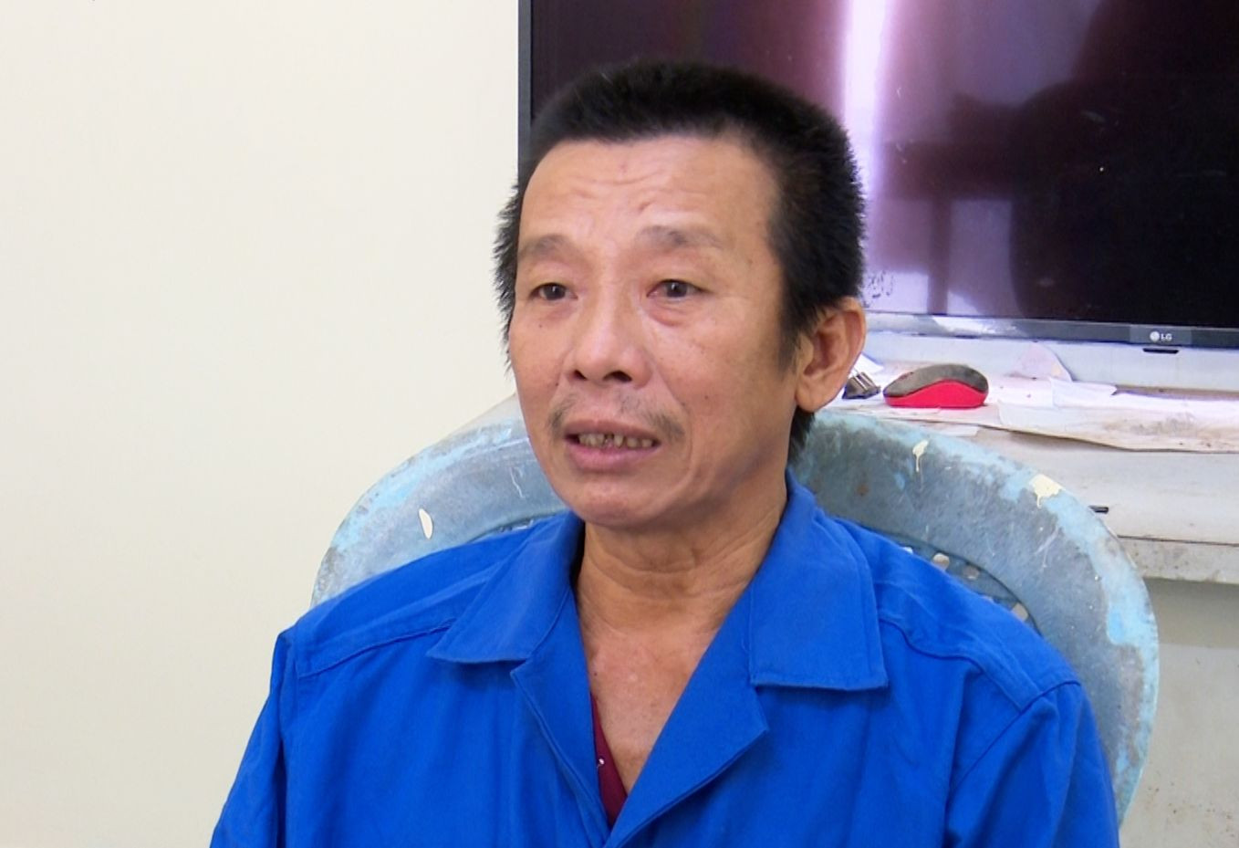 Phan Văn Bi tại cơ quan công an. Ảnh: Nghiêm Túc.