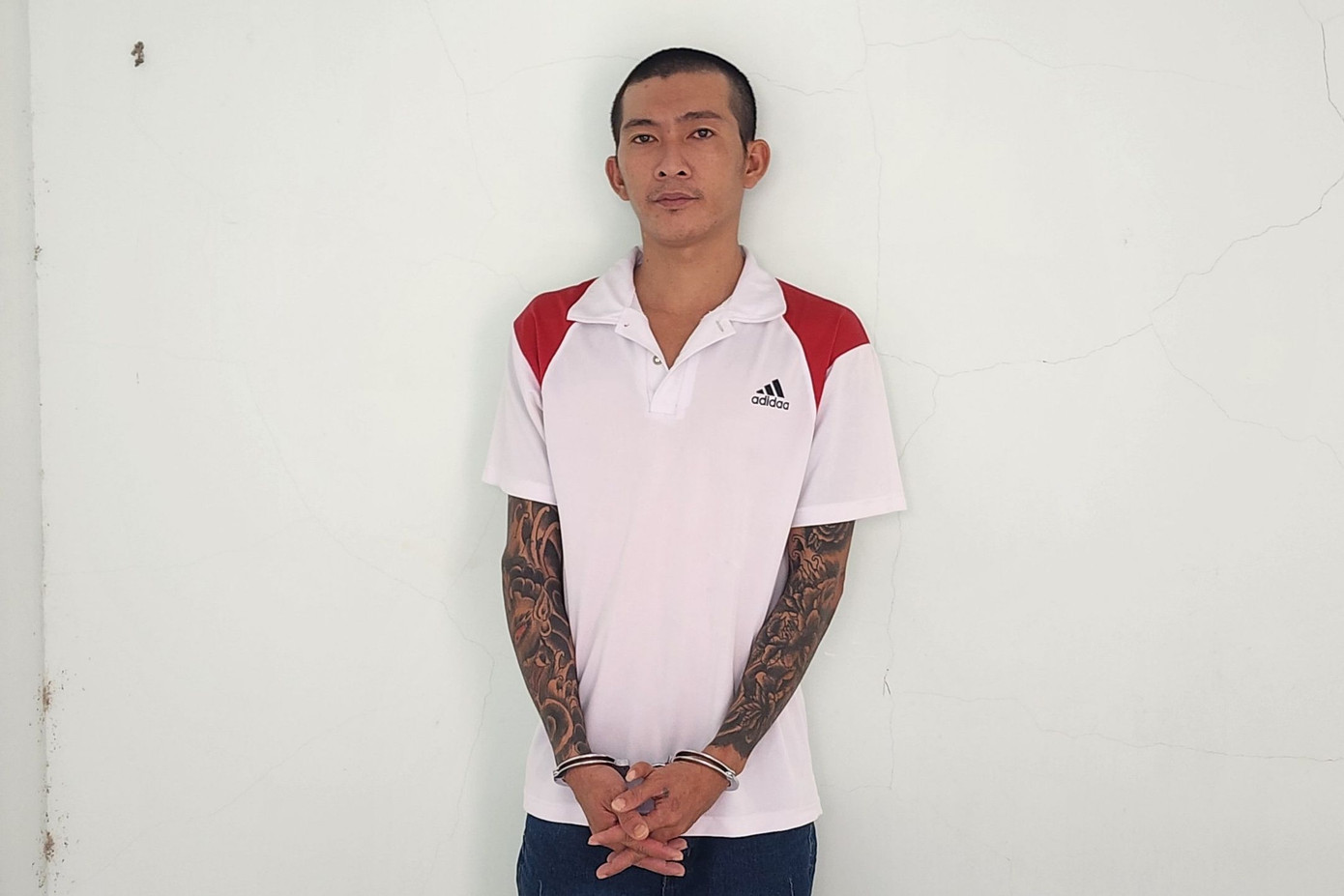 Nguyễn Thanh Tuấn tại cơ quan công an. Ảnh: Văn Vũ.