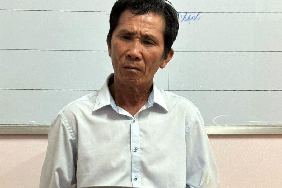 Huỳnh Văn Hoàng tại cơ quan công an.