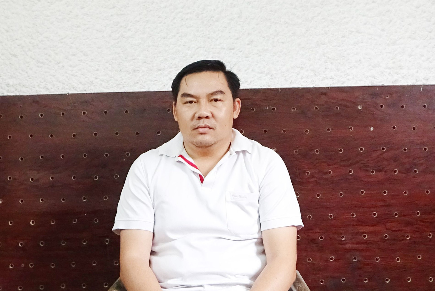 Lê Tấn Nguyên tại cơ quan công an.