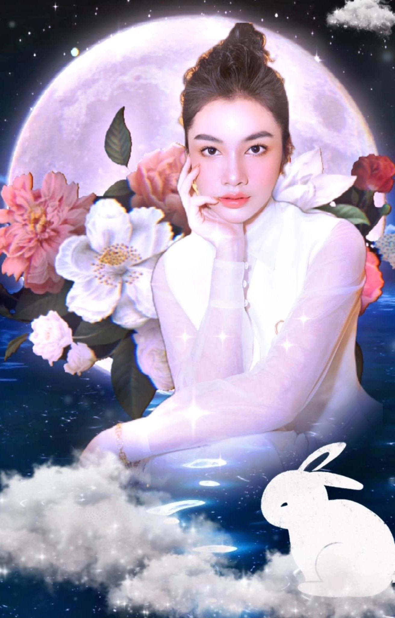 Người đẹp Cẩm Đan hoá chị Hằng xinh đẹp và kiêu sa với tông màu trắng tinh khiết.