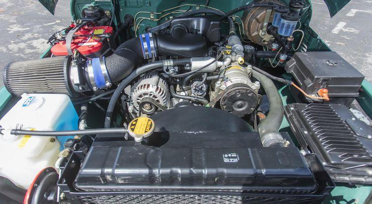 Phần động cơ của chiếc xe đảm bảo về yêu cầu khí thải của bang California Phần động cơ của chiếc xe đảm bảo về yêu cầu khí thải của bang California