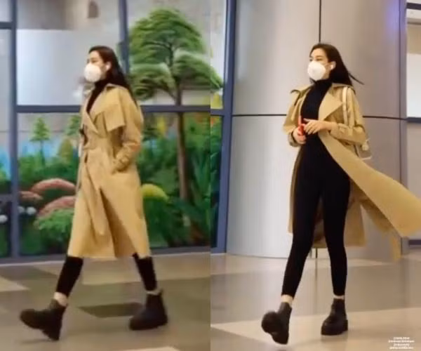 Một chiếc áo khoác dáng dài, set đồ full đen mix cùng vài món phụ kiện và đôi boot cổ ngắn sẽ khiến set đồ của bạn bớt đơn điệu mà lại cực sang - xịn - mịn như Hoa hậu Đỗ Thị Hà.