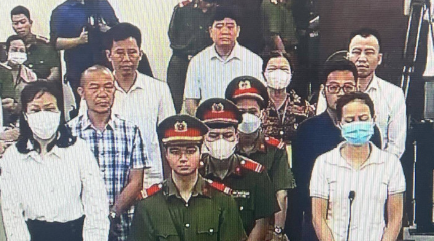 Ông Nguyễn Đức Chung tại phiên tòa (Ảnh: Chụp qua màn hình tivi) Ông Nguyễn Đức Chung tại phiên tòa (Ảnh: Chụp qua màn hình tivi)