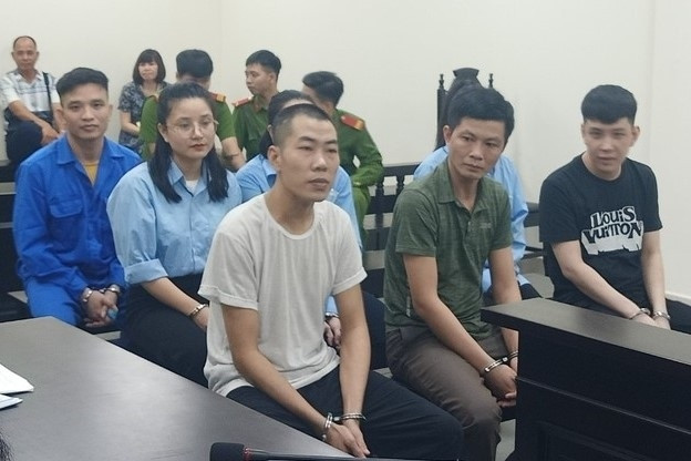 Nhóm bị cáo tại phiên tòa.