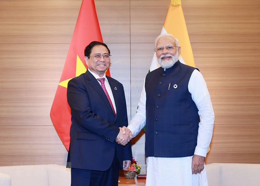 Thủ tướng Phạm Minh Chính gặp Thủ tướng Ấn Độ Narendra Modi. (Ảnh: Dương Giang/TTXVN)