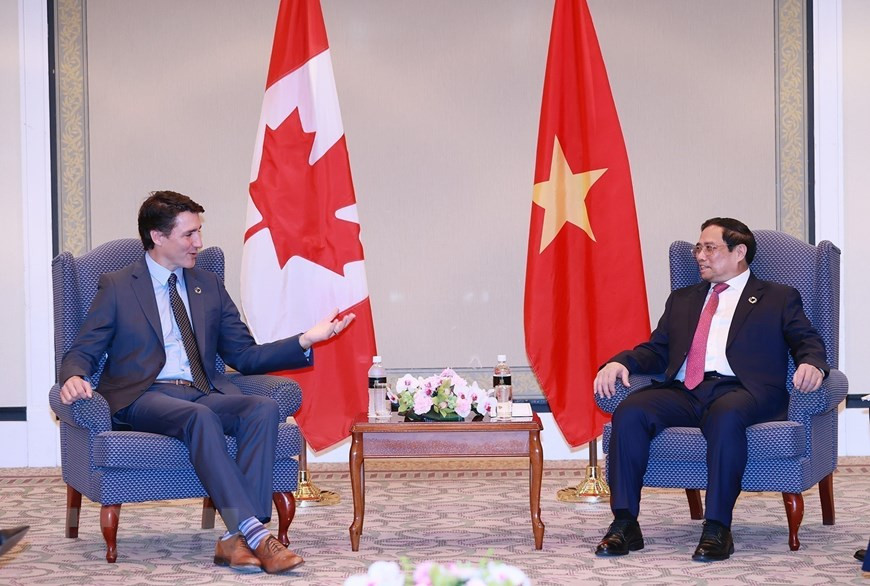 Thủ tướng Phạm Minh Chính gặp Thủ tướng Canada Justin Trudeau. (Ảnh: Dương Giang/TTXVN)