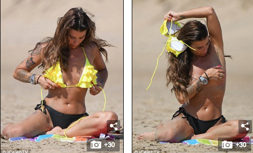 Jenny Thompson thản nhiên cởi áo phơi nắng trên biển ảnh 1