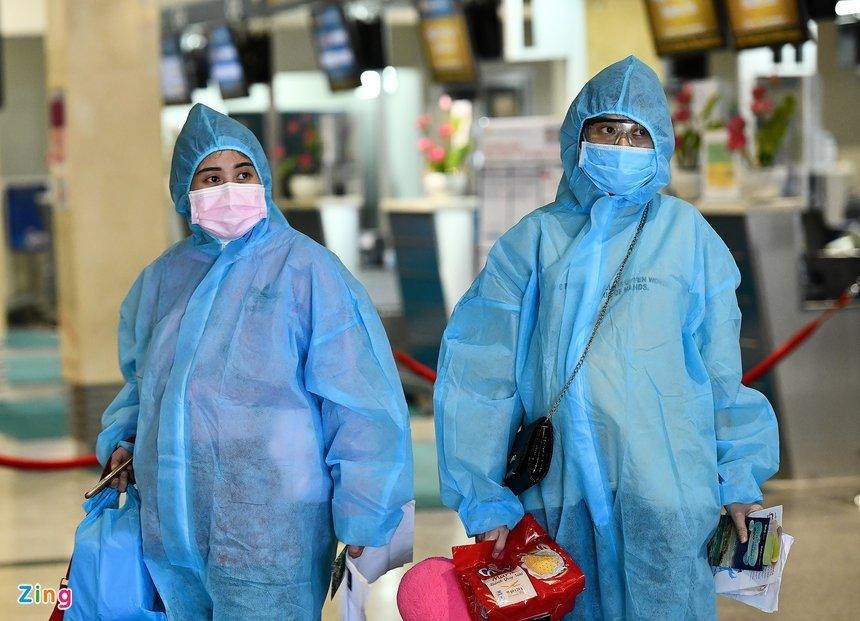 Quy định cách ly người về quê ăn Tết ở mỗi nơi một kiểu khiến người dân hoang mang. Ảnh: Phạm Ngôn.