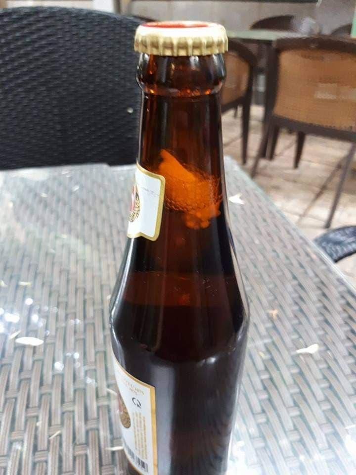 Chai bia trong vụ án.