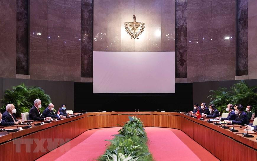 Hình ảnh Chủ tịch nước Nguyễn Xuân Phúc hội đàm Bí thư thứ nhất Ban Chấp hành Trung ương Đảng Cộng sản Cuba, Chủ tịch nước Cộng hòa Cuba Miguel Díaz-Canel. (Ảnh: Thống Nhất/TTXVN)