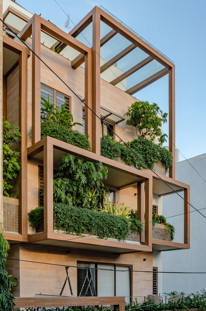 Kiến trúc sư làm mặt tiền theo dạng hình khối xếp chồng lên nhau một cách ngẫu nhiên.