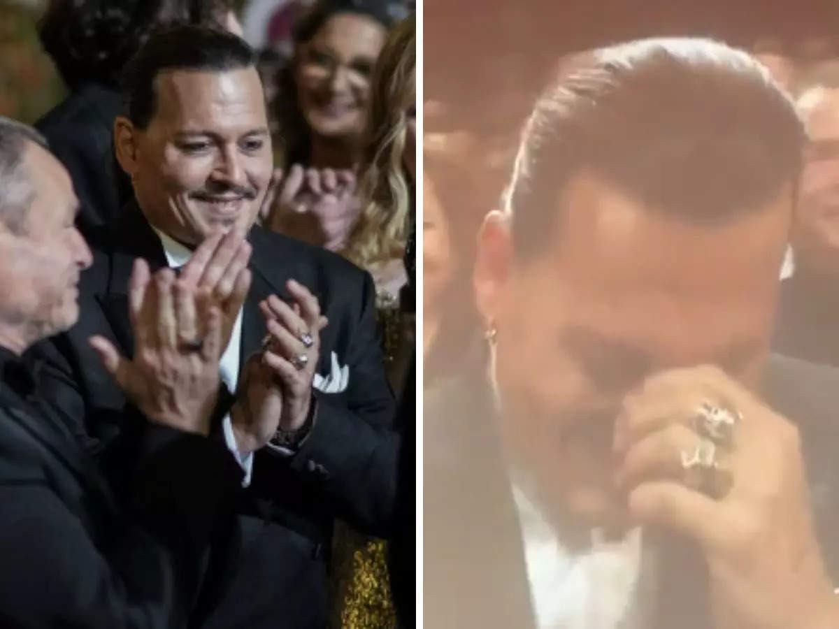 Khoảnh khắc Johnny Depp bật khóc trong tràng vỗ tay của khán giả. Ảnh: The Independent