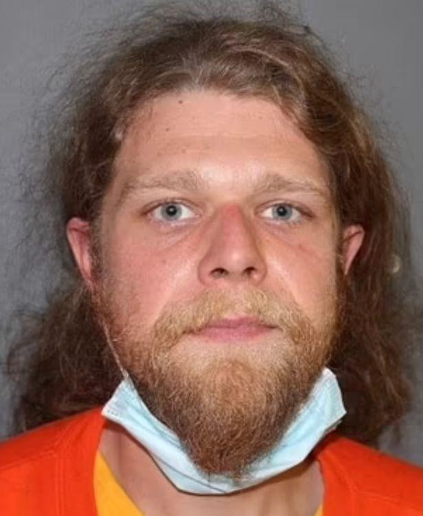 Ryan Kramer - một thành viên giáo phái vừa bị bắt nhưng không bị buộc tội về cái chết của nữ thủ lĩnh Carlson.