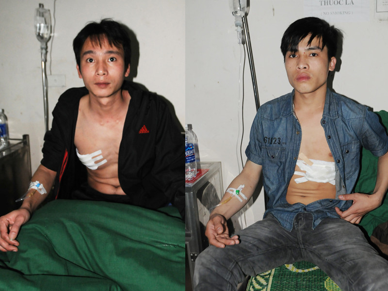 Lê Xuân Trung và Đặng Đức Giang tại bệnh viện huyện Mê Linh. Ảnh: Tuấn Nguyễn