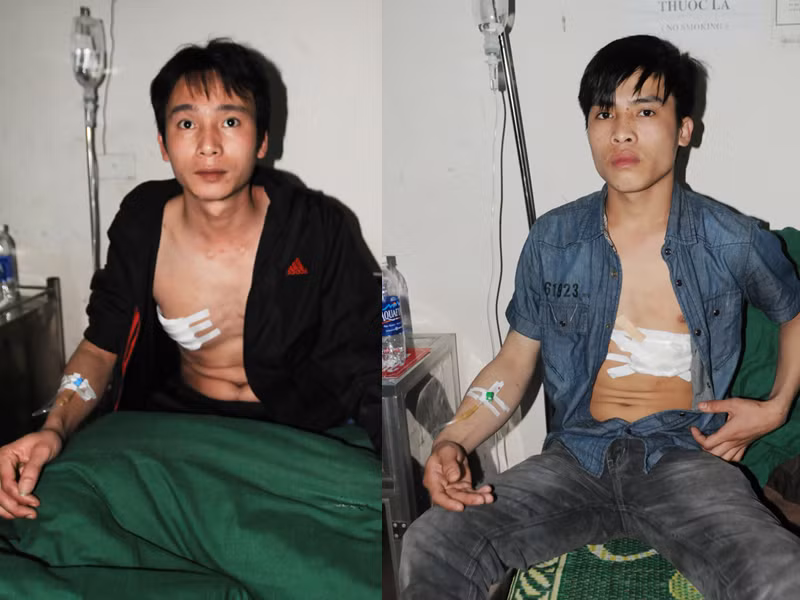 Lê Xuân Trung và Đặng Đức Giang tại bệnh viện huyện Mê Linh. Ảnh: Tuấn Nguyễn