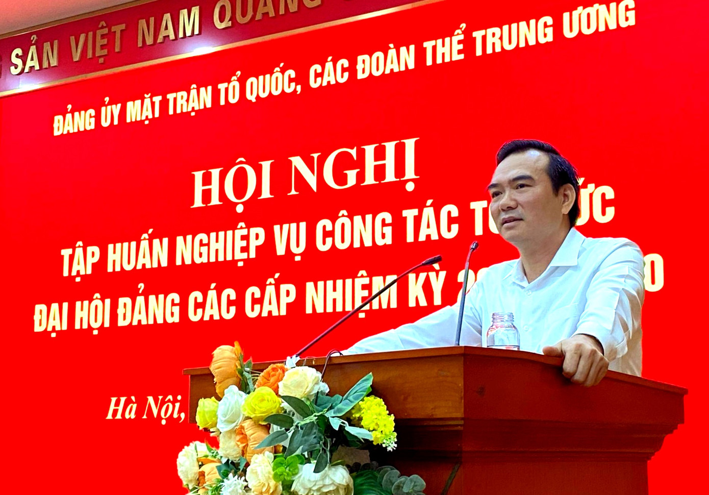 Ông Nguyễn Minh Chung - Trưởng Ban Tuyên giáo và Dân vận Đảng uỷ MTTQ, các đoàn thể Trung ương, phát biểu tại hội nghị. Ảnh: TP.