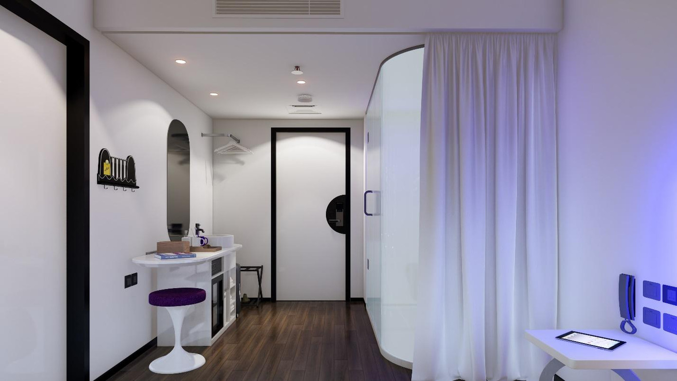 Hình ảnh nội thất phòng của SOJO Hotels với tablet thông minh điều khiển