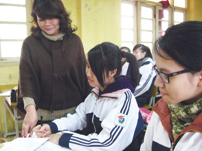 Những học sinh lớp 12 này sẽ trở thành cử nhân sau một năm rưỡi rời trường THPT?	Ảnh: Hồ Thu