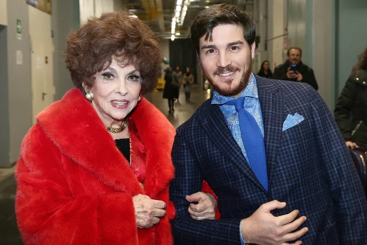 Gina Lollobrigida và trợ lý cá nhân Andrea Piazzolla. Ảnh: Shutterstock.