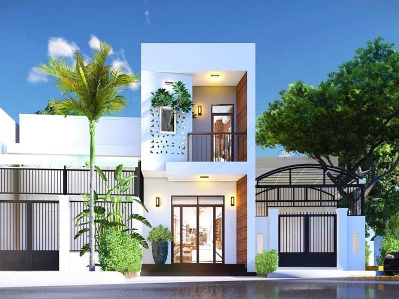 Vẫn là màu sơn trắng quen thuộc, ngôi nhà được tô điểm với cửa kính khung nhôm đơn giản, gạch giả gỗ ốp trần bên hông, lan can sắt và đặc biệt là mảng tường thông gió đặc sắc. Những chi tiết này kết hợp đồng điệu với nhau, mang đến cảm giác gần gũi, nhẹ nhàng cho công trình.