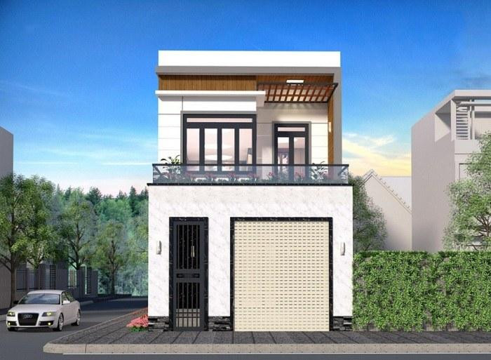 Cổng của mẫu nhà ống này được bố trí 2 bên. Một bên là lối đi nhỏ làm bằng cửa sắt. Bên kia là cửa cuốn dành cho xe hơi. Thiết kế này đem đến sự thuận tiện tối đa cho sinh hoạt của cả gia đình. Trong khi hệ lan can kính tạo cảm giác rộng rãi cho ngôi nhà.