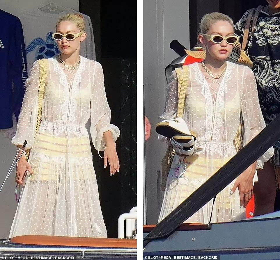 Sau đó, Gigi thay chiếc váy xuyên thấu chấm bi màu trắng bay bổng.