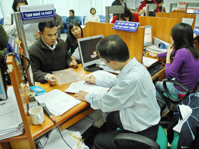 Nộp thuế thu nhập cá nhân tại Chi cục thuế Hai Bà Trưng Ảnh: X.Phú