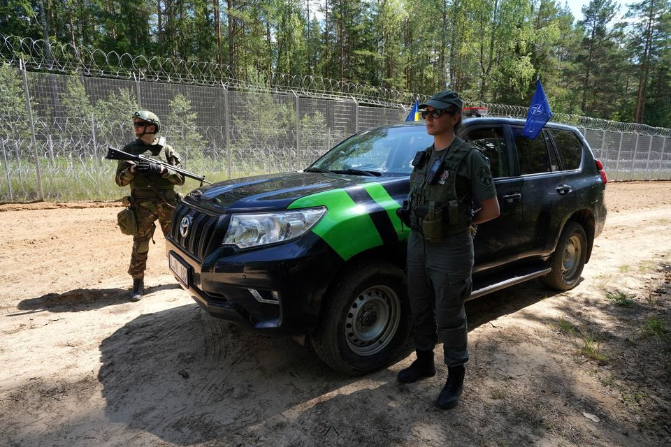 Lực lượng tuần tra biên giới Litva - Belarus. Ảnh: Reuters Lực lượng tuần tra biên giới Litva - Belarus. Ảnh: Reuters