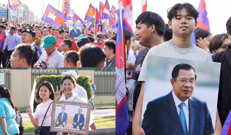 Đám đông cầm ảnh Chủ tịch Thượng viện Campuchia Hun Sen và Thủ tướng Hun Manet trong cuộc tuần hành ở Phnom Penh, ngày 18/6. (Ảnh: Khmer Times) Đám đông cầm ảnh Chủ tịch Thượng viện Campuchia Hun Sen và Thủ tướng Hun Manet trong cuộc tuần hành ở Phnom Penh, ngày 18/6. (Ảnh: Khmer Times)