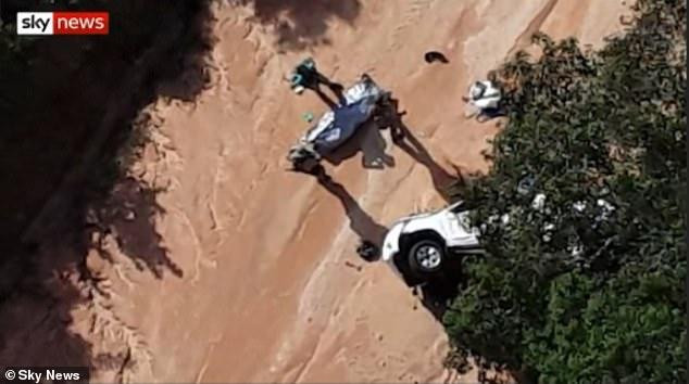 Thi thể người nằm rải rác trên đường sau vụ đột kích ngày 24/3. Ảnh: Sky News