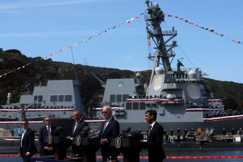 Lãnh đạo AUKUS trong lễ công bố chi tiết thoả thuận chuyển giao và chế tạo tàu ngầm chung ngày 13/3. (Ảnh: Reuters) Lãnh đạo AUKUS trong lễ công bố chi tiết thoả thuận chuyển giao và chế tạo tàu ngầm chung ngày 13/3. (Ảnh: Reuters)