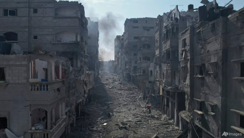 Một dãy phố tan hoang sau khi bị Israel oanh tạc ngày 11/10. (Ảnh: AP) Một dãy phố tan hoang sau khi bị Israel oanh tạc ngày 11/10. (Ảnh: AP)