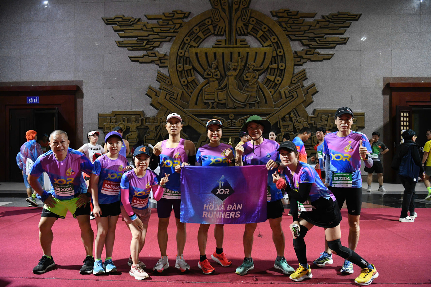 Tinh thần 'vượt nắng thắng mưa' trên đường chạy Tiền Phong Marathon ảnh 4 Tinh thần 'vượt nắng thắng mưa' trên đường chạy Tiền Phong Marathon ảnh 4