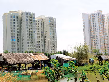 Mặc dù thị trường nhà đất “đóng băng” nhưng báo cáo cho thấy nhiều doanh nghiệp bất động sản vẫn lãi lớn. Ảnh: Phạm Kim Ngân