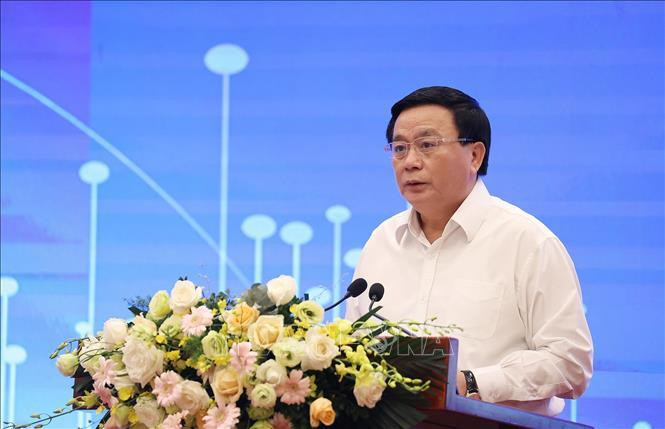 Đồng chí Nguyễn Xuân Thắng, Uỷ viên Bộ Chính trị, Chủ tịch Hội đồng Lý luận Trung ương, Giám đốc Học viện Chính trị quốc gia Hồ Chí Minh phát biểu khai mạc hội thảo. Ảnh: Dương Giang/TTXVN.