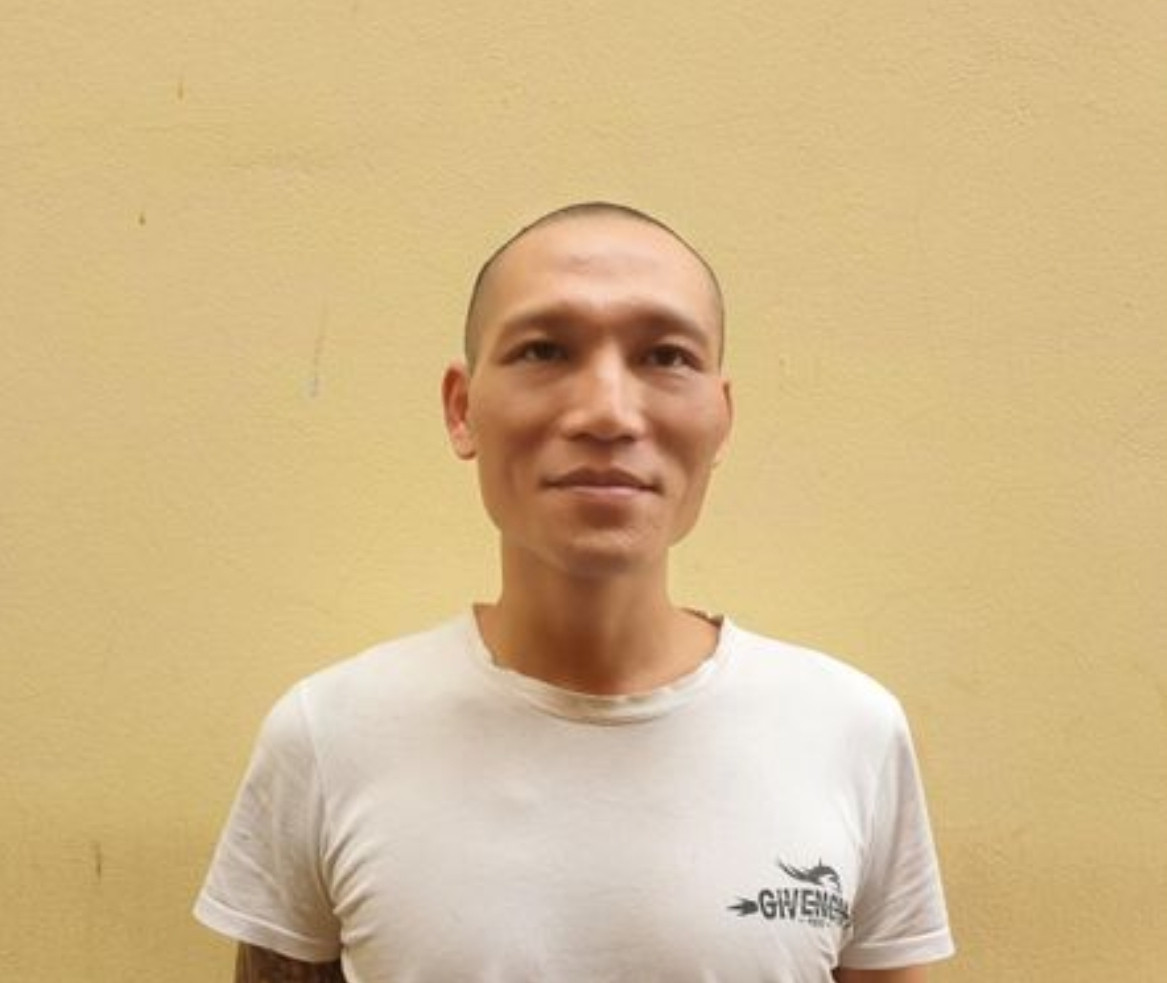 Trần Mạnh Hùng tại cơ quan công an. Trần Mạnh Hùng tại cơ quan công an.