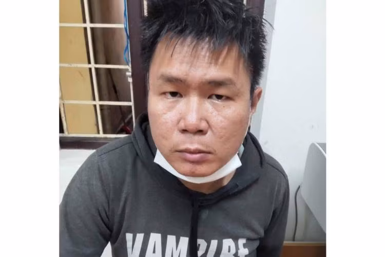 Đối tượng Trần Quang Minh tại cơ quan công an.