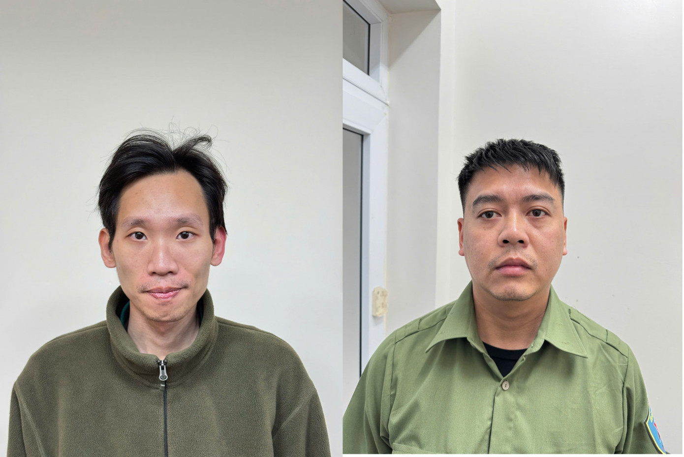 2 bảo vệ của Công ty kho vận cảng Cẩm Phả (từ trái qua phải) Nguyễn Thế Anh và Nguyễn Quốc Việt.