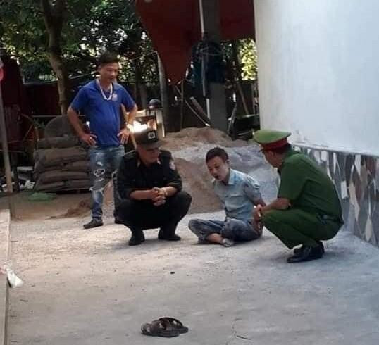 T. sau khi bị lực lượng chức năng khống chế.