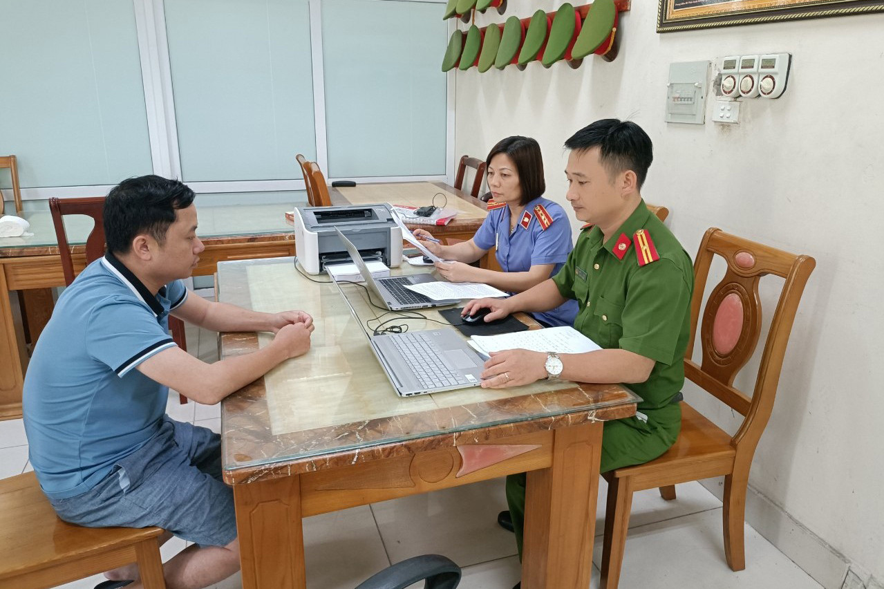 Đào Quang Hiệp tại cơ quan Công an.