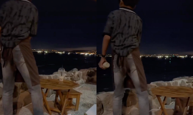 Hình ảnh nhân viên quán cà phê Jeju ném ly nhựa đã sử dụng xuống biển, được du khách quay lại.